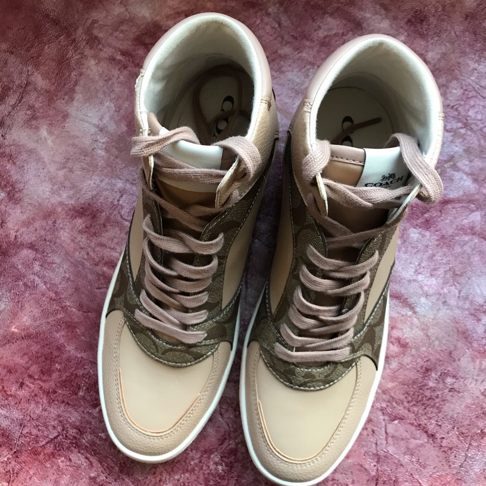Brand new Coach leather women’s hi top sneakers